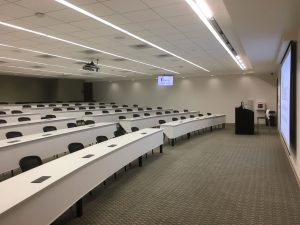 A view of an auditorium style room in the College of Dental Medicine. 